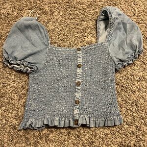 Blue cropped top with ruffled sleeves